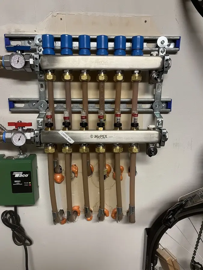 Plumber performing Water Heater Repair at a residential property in Butner